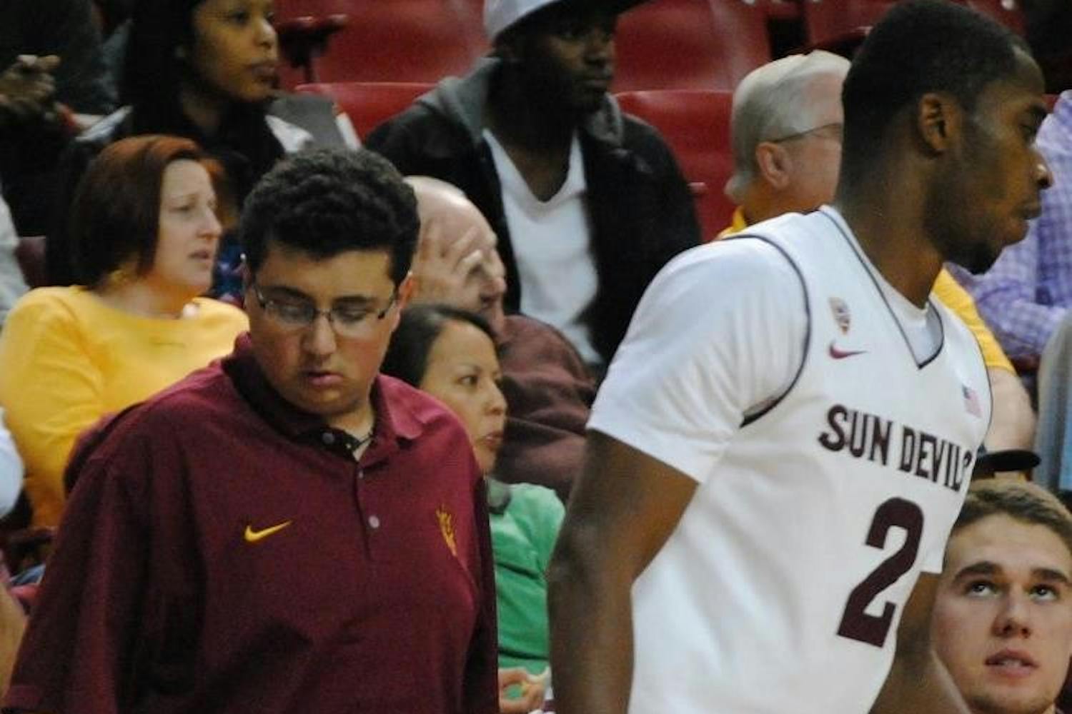 Antonio Cannavaro works behind the bench during the Arizona State vs. Arkansas Pine-Bluff game on November 28th, 2012. ASU won 67-54. Photo by Nick Krueger