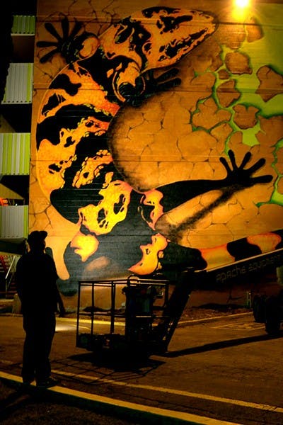 Artist Aztec Smurf looks at his finished work. The Mark will hold an unveiling on Thursday from noon to 3 p.m. to celebrate the mural and the renovations. (Photo by Rachel Nemeh)