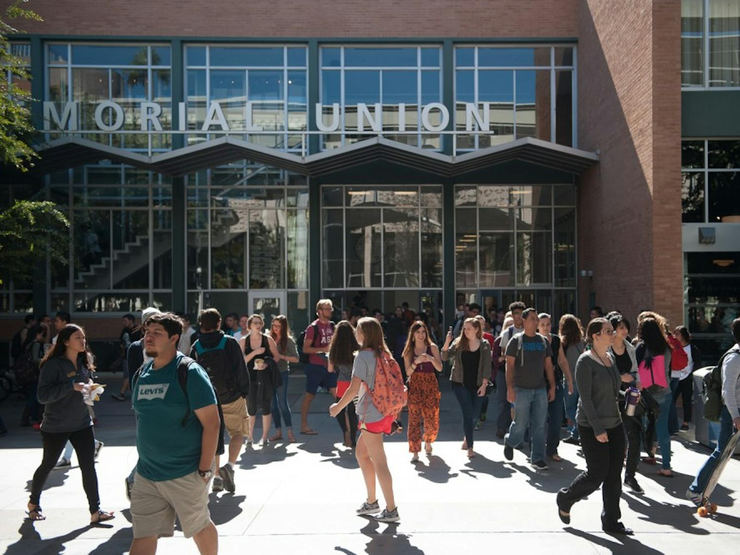 People evacuate the Memorial Union on Monday, Nov. 2, 2015, on the Tempe campus. ASU Police are investigating a shooting threat made against the University last night on the anonymous internet message board 4chan.