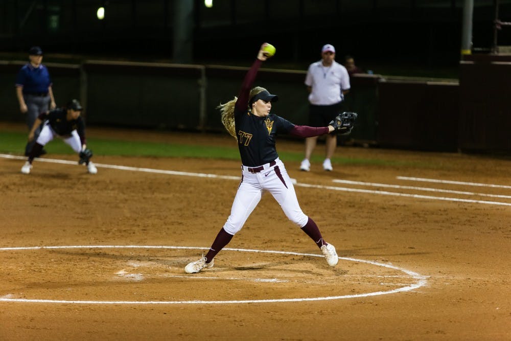 Adam Barrington works on some art at Bud's Glass Joint at a First Friday earlier this summer. (Photo by Diana Lustig)