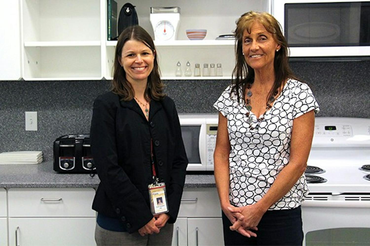 Dr. Carol Johnston (left) and Dr. Karen Sweazea pose for a portrait in the Arizona Biomedical Collaborative Building, Monday, Dec. 1, 2014 in downtown Phoenix. Dr. Johnston and Dr. Sweazea work in a lab to produce testing materials for their research on type 2 diabetes. (Photo by Tynin Fries)