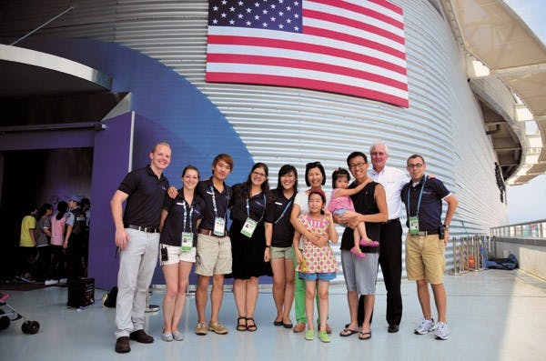 U.S. student ambassadors, including English education graduate student Sarah Slagle, welcome visitors to the USA Pavilion at the 2012 World Expo in Yeosu, South Korea. (Photo courtesy of The State Department)