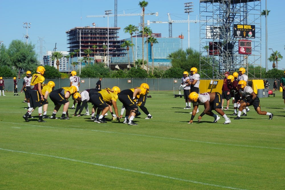 A football practice held in the Fall of 2014.
