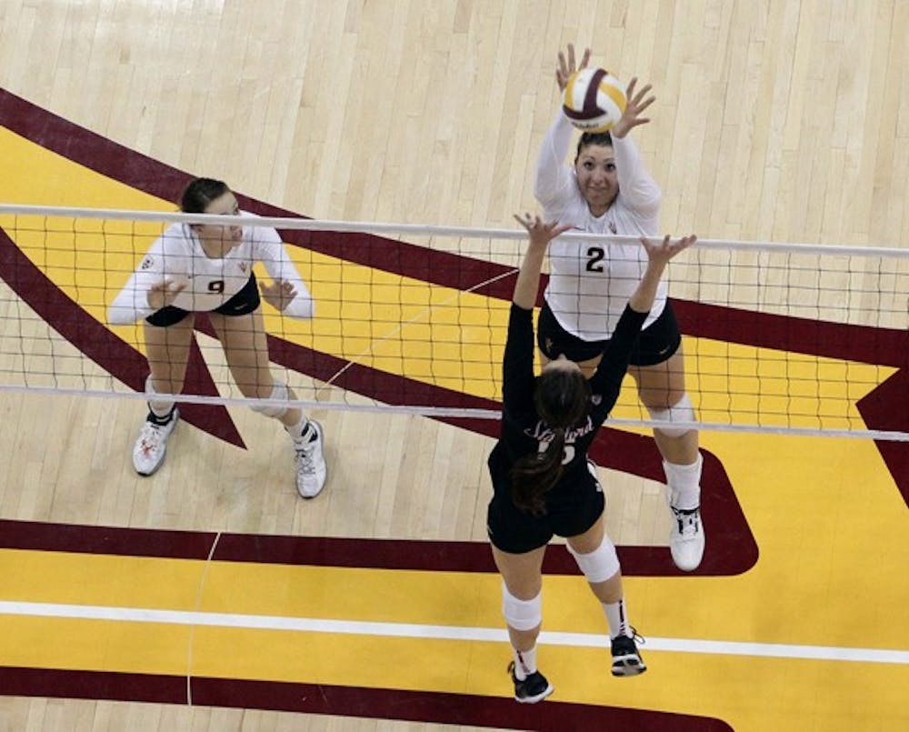 ASU senior middle blocker Sonja Markanovich reaches for the ball during the Sun Devils’ loss to Stanford on Oct. 22. Despite a solid weekend from Markanovich and freshman setter Shannan McCready, ASU fell to USC and UCLA. (Photo by Beth Easterbrook)