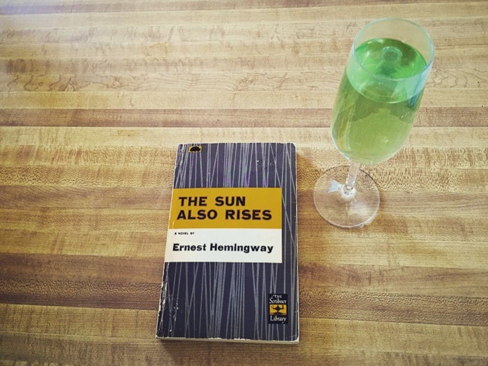 Named after Hemingway's&nbsp; book on bullfighting, the drink "Death in the Afternoon" is pictured with this week's featured book "The Sun Also Rises".