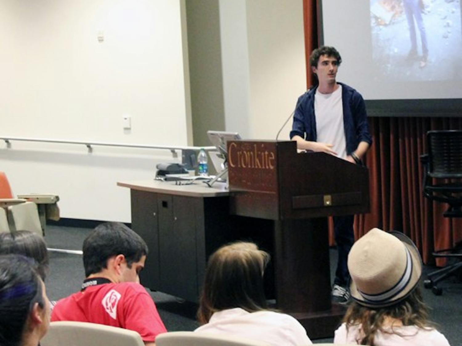 Italian photojournalist Ruben Salvadori speaks to students about the effects of the presence of photographers in situations at the Downtown campus Monday night. (Photo by Diana Lustig)
