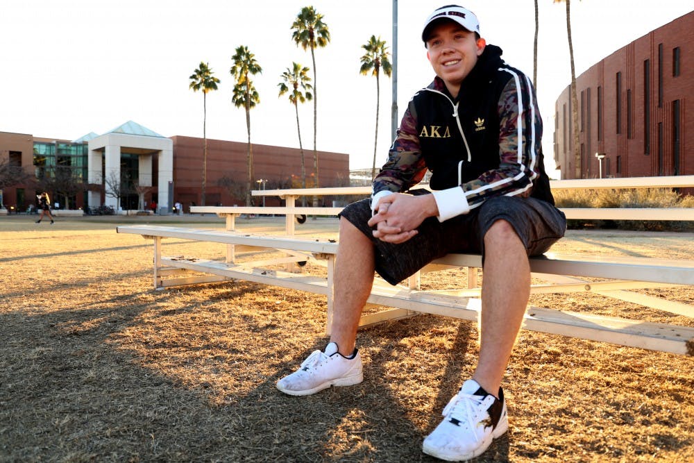 Sun Devil Support Network Adivsor Evan Dudley, 19, poses for a portrait on the Sun Devil Fitness Center fields on Tuesday, Jan. 13, 2015, on the Tempe campus. Dudley is a sophomore studying criminal justice.