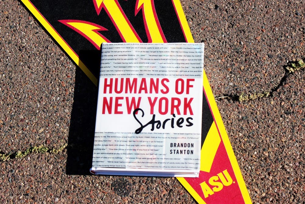 'Humans of New York: Stories' by Brandon Stanton is pictured on top of an ASU flag Tuesday, April 5, 2016. Brandon Stanton is coming to the ASU Tempe campus on Wednesday, April 6, 2016, at 6pm on the Barrett Lawn on the Tempe campus.