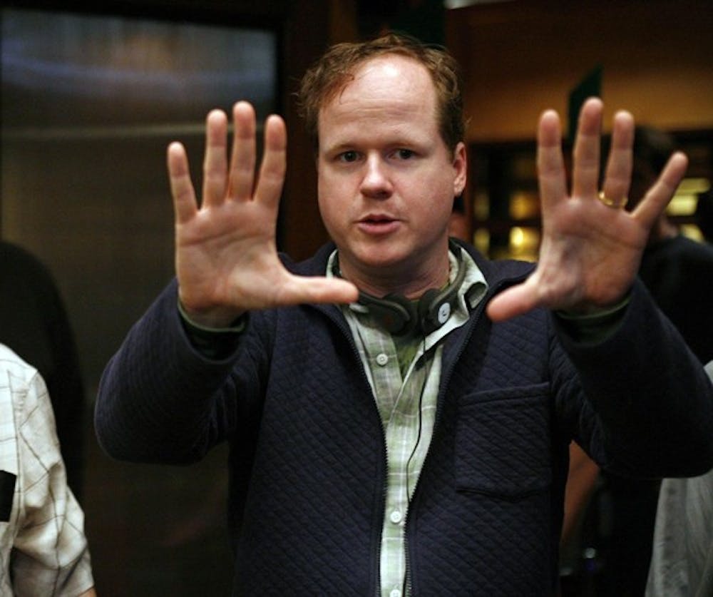 DOLLHOUSE:  Joss Whedon (R) directing on set with director of photography Ross Berryman (L).  &#xc2;&#xa9;2009 Fox Broadcasting Co.  Cr:  Greg Gayne/FOX