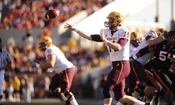 PICKED OFF: Redshirt junior quarterback Steven Threet releases a pass Saturday against Oregon State. Threet was intercepted three times in the 31-28 loss after throwing four last week against Oregon. (Photo Courtesy of The Daily Barometer)