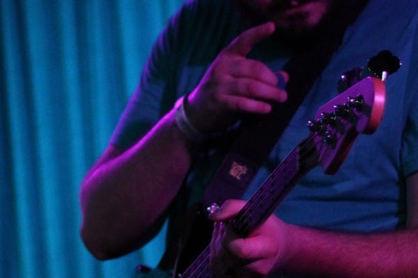 Playboy Manbaby bassist Chris Hudson performs at a concert on Saturday, Aug. 23 at Crescent Ballroom in downtown Phoenix. (Photo by Zane Jennings)