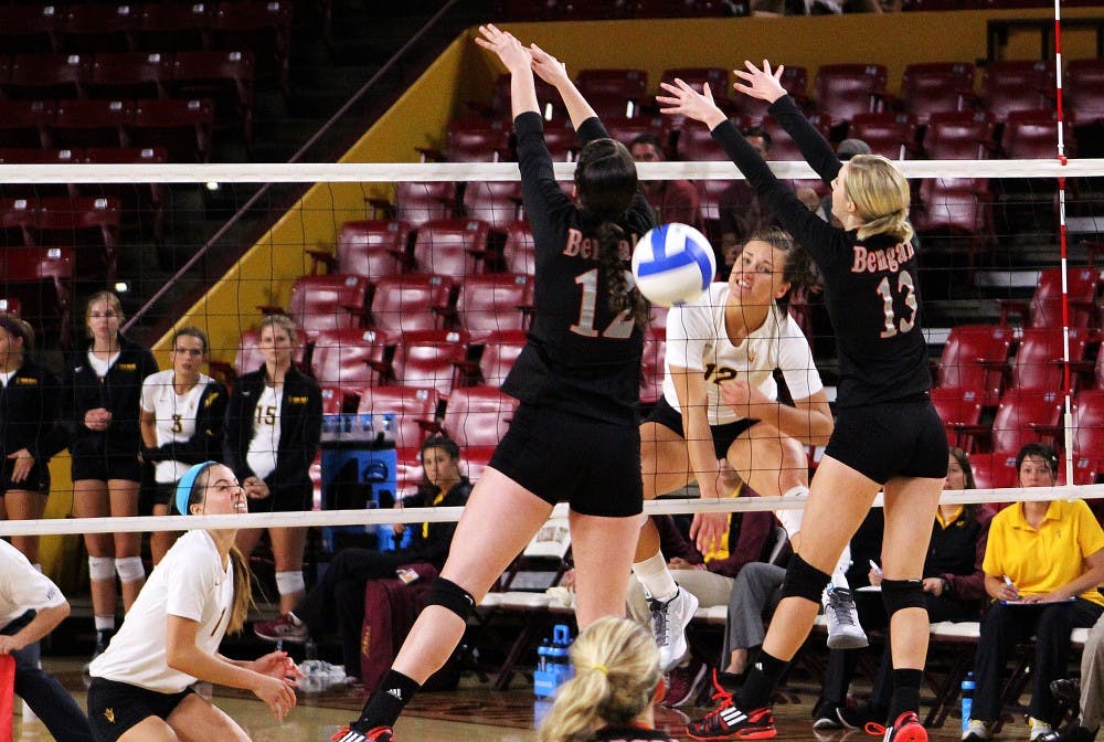 Junior outside hitter Macey Gardner spikes a ball over the net for a point during the Residence Inn Challenge against Idaho State University on Friday, Sept. 5, 2014, at Wells Fargo Arena. ASU won the game 3-1. (Photo by Sawyer Hardebeck)