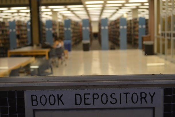 An unused book-return panel guards the windows of Hayden Library.
Photo by Mackenzie McCreary