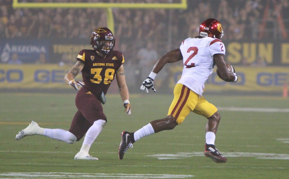 Redshirt senior defensive back Jordan Simone (38) pursues USC wide receiver Andoree' Jackson in the second quarter against University of Southern California Saturday, Sept. 26, 2015 at Sun Devil Stadium in Tempe. 