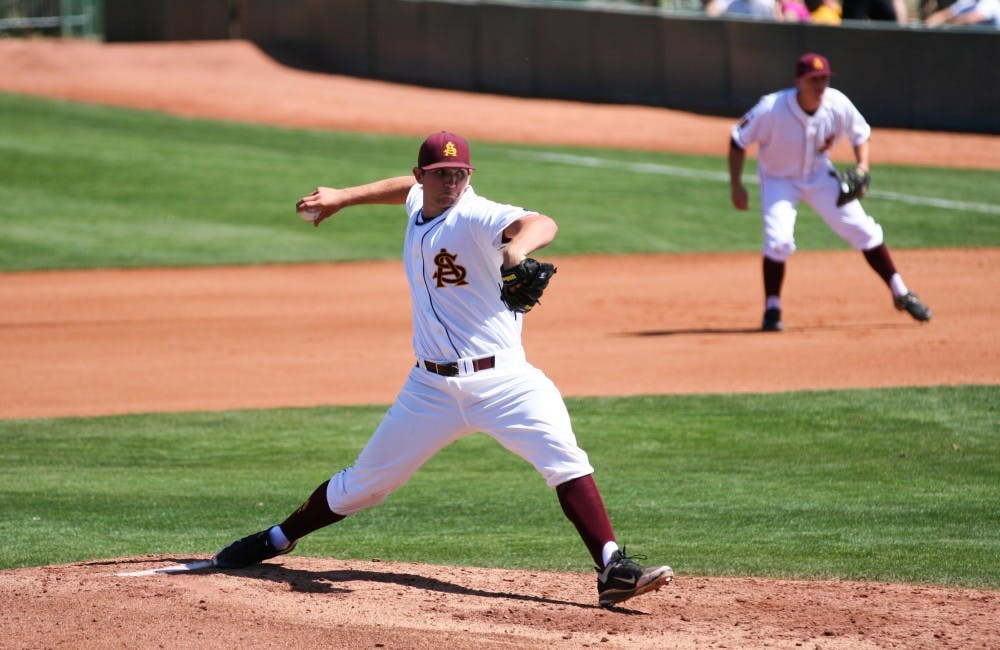 UA defeated: Sophomore Jake Barrett delivers a pitch during the Sun Devils’ 8-1 victory over UA on Sunday. The win gave ASU the series victory in the first weekend of Pac-10 play. (Photo by Lisa Bartoli)