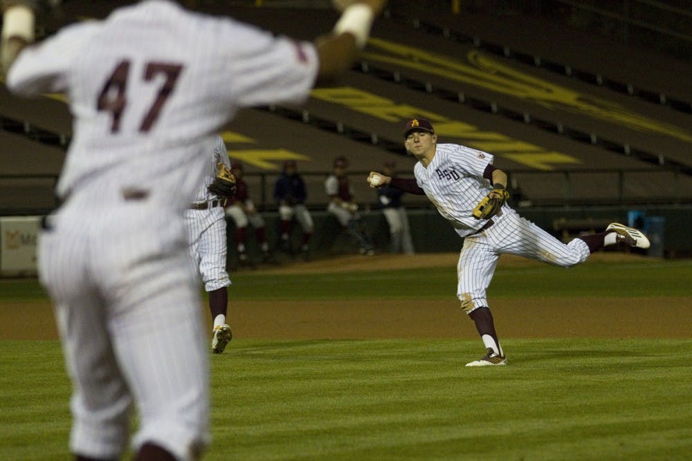 ASU sophomore shortstop Jeremy McCuin (10) picks up the ball in an attempt to throw to first base during game two of a baseball series versus Loyola Marymount University in Phoenix Municipal Stadium in Phoenix on Saturday, March 4, 2017. ASU lost 3-2. 