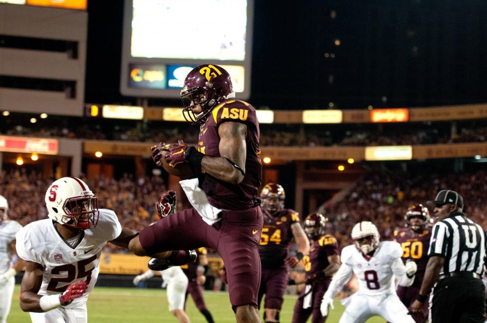 Redshirt junior wide receiver Jaelen Strong catches a pass in the enzone. ASU beat Stanford 26-10 at Sun Devil Stadium on Saturday Oct. 8, 2014. (Photo by Mario Mendez)