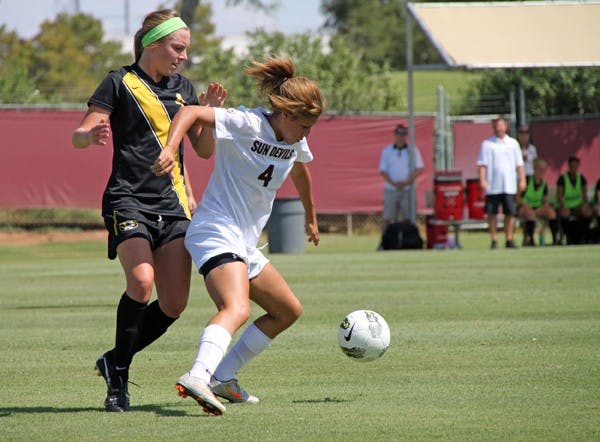 TOP-RANKED FOES: ASU freshman midfielder Jessica DeLeon fights off Missouri midfielder Haley Krentz during the Sun Devils’ loss to the Tigers on Sept. 11. ASU welcomes No. 1 Stanford to Tempe on Friday night in front of a national TV audience. (Photo by Rosie Gochnour)