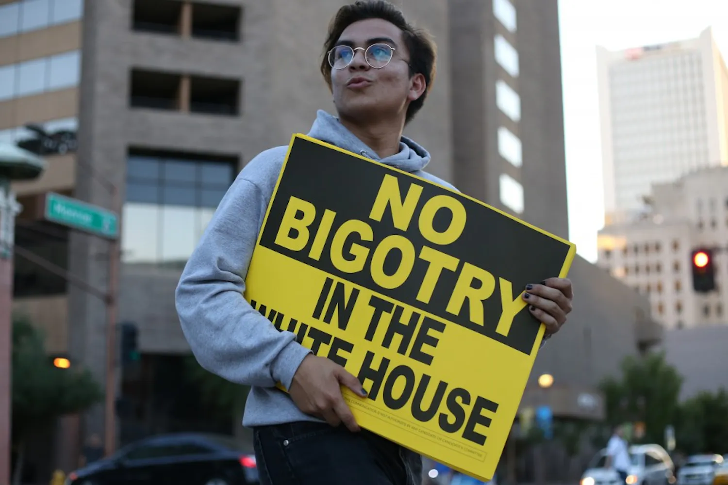 A protestor marches around downtown Phoenix during a Trump rally on Wednesday, Aug. 31, 2016.