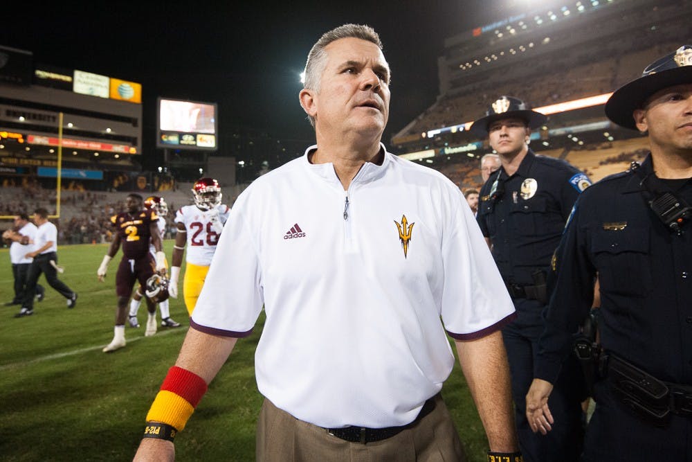 Head coach Todd Graham enters the field after losing to USC on Saturday, Sept. 26, 2015, at Sun Devil Stadium in Tempe. The Trojans defeated the Sun Devils 42-14.