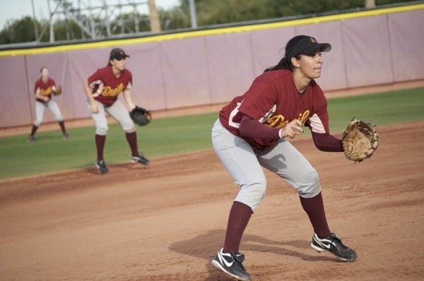 READY FOR THE SEASON: Junior Infielder Christina Zambrana readies herself just before the picth is thrown in a practice game last season. (Photo by Rosie Gochnour)