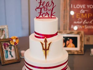 The couple had their wedding cake topped with "Fear the Fork."