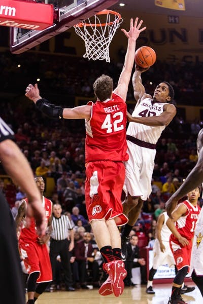Utah freshman forward Jakob Poetl blocks ASU sophomore forward Shaquielle McKissic's attempt to dunk, Thursday, Jan. 15, 2015, at Wells Fargo Arena in Tempe. McKissic struggled all game from the field, shooting just 30% in a 76-59 Arizona State loss. (Daniel Kwon/The State Press)