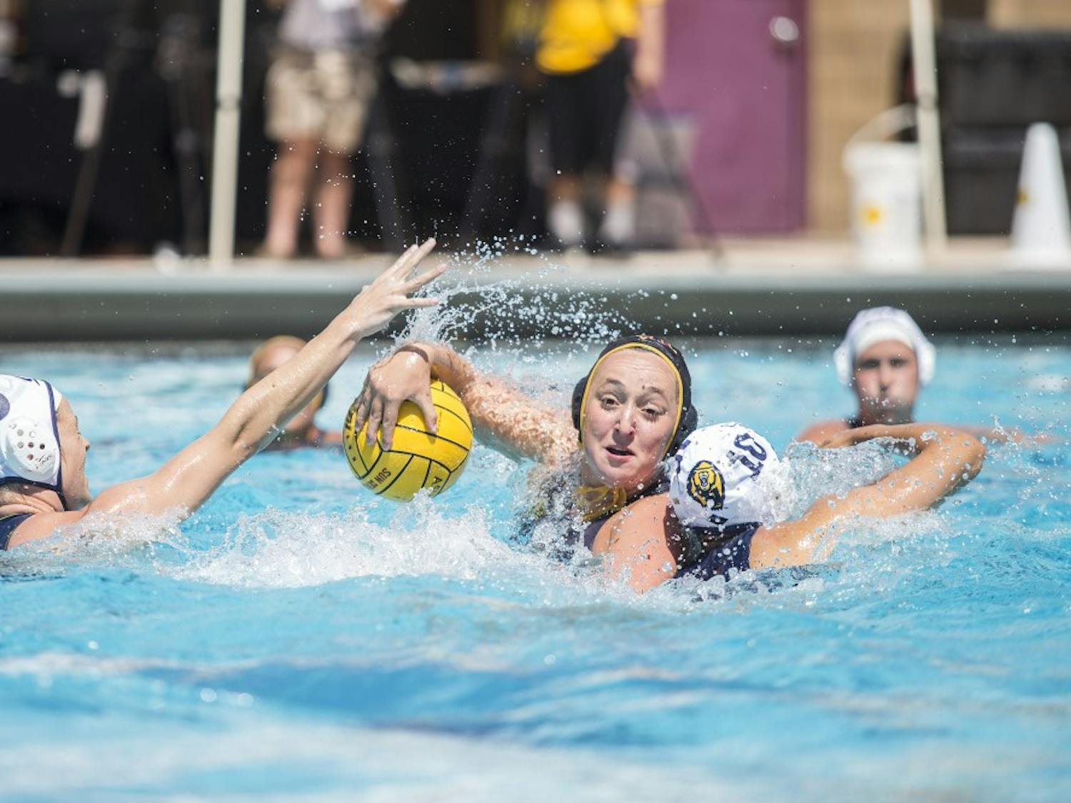 ASU defender Katie Svercheck looks to pass during a game against the Cal State Bears at Mona Plummer Aquatic Center in Tempe, Arizona, on Saturday, April 2, 2016. The Sun Devils won the match, 7-6, in sudden-death overtime. 