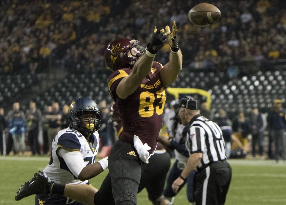 Redshirt junior tight end Kody Kohl (83) attempts to catch a pass in the second quarter during the Motel 6 Cactus Bowl on Saturday, Jan. 2, 2016, at Chase Field in Phoenix.  