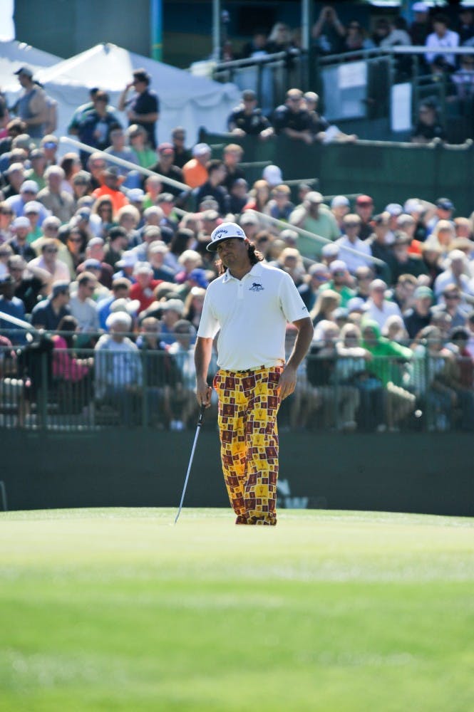 Former ASU golfer Pat Perez waits to putt at the 16th hole of the 2015 Waste Management Phoenix Open on Feb. 1, 2015. (Andrew Ybanez/The State Press)