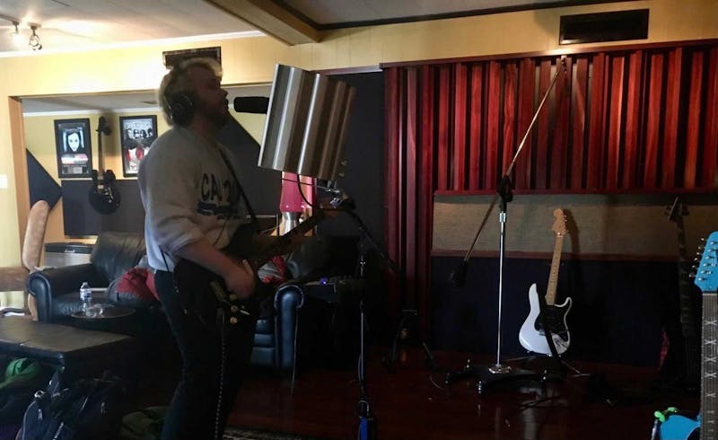 ASU senior Vaughan Jones practices in the Sonic Jones Recording studio in Henderson, LA on an unknown date in December, 2020. Jones is a vocalist, guitarist and bassist for the band Cablebox.