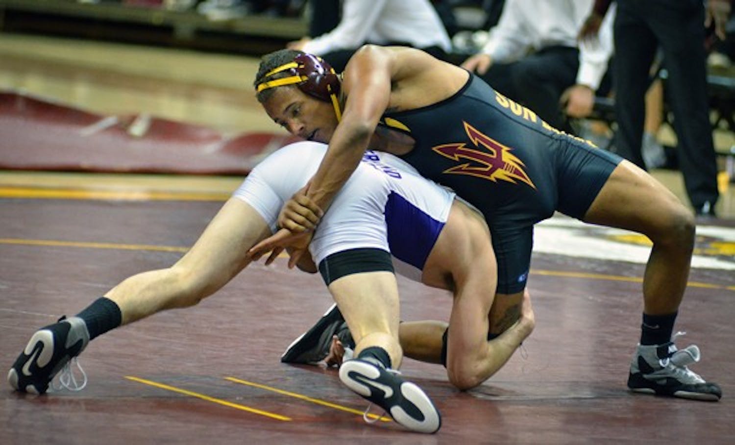 Redshirt freshman Hans Rasmusson attempts to contain GCU junior Bobby Ward during the Sun Devils’ meet with the ‘Lopes and Embry-Riddle on Nov. 13. The Sun Devils compete in one of their most pivotal tournaments of the season at the Cliff Keen Las Vegas Invitational on Friday and Saturday. (Photo by Aaron Lavinsky)