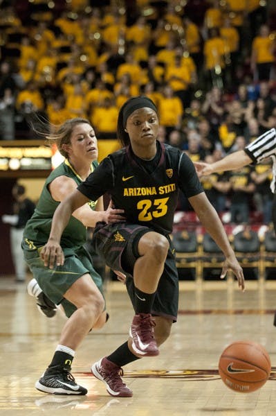 Freshman guard Elisha Davis blows past an Oregon defender on Jan. 11. The ASU women’s basketball team hopes to get past USC and UCLA with some victories. (Photo by Molly J Smith)