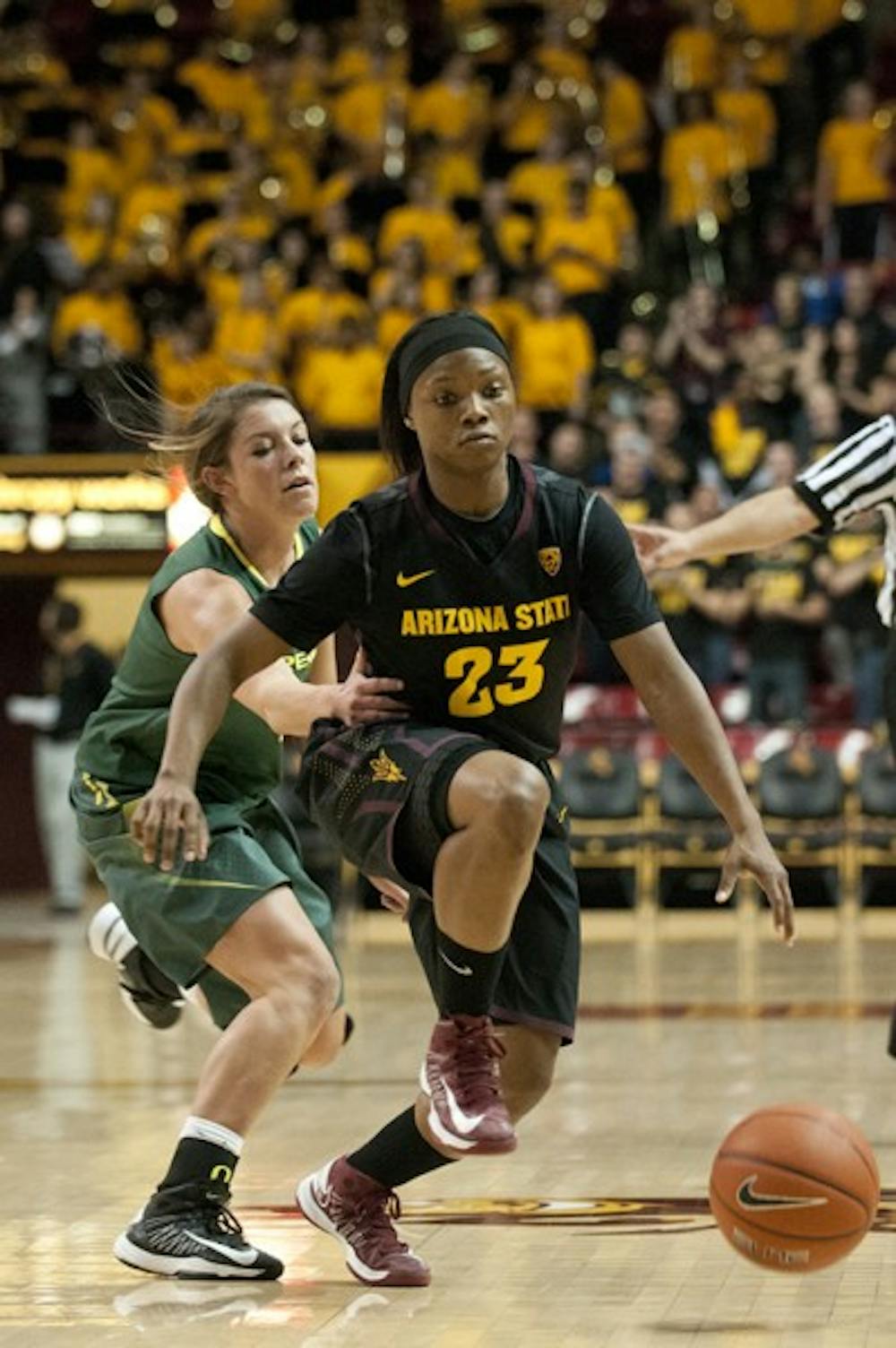Freshman guard Elisha Davis blows past an Oregon defender on Jan. 11. The ASU women’s basketball team hopes to get past USC and UCLA with some victories. (Photo by Molly J Smith)
