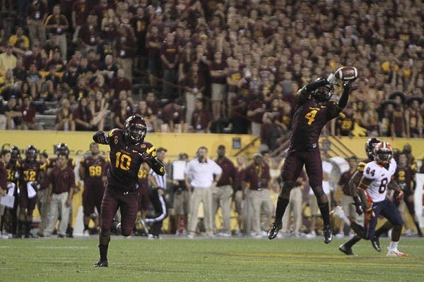 Redshirt senior safety Keelan Johnson (10) watches as Alden Darby (4) intercepts a pass. The ASU defense has been preparing to stop Missouri junior quarterback James Franklin all week in practice.  (Photo by Sam Rosenbaum)

