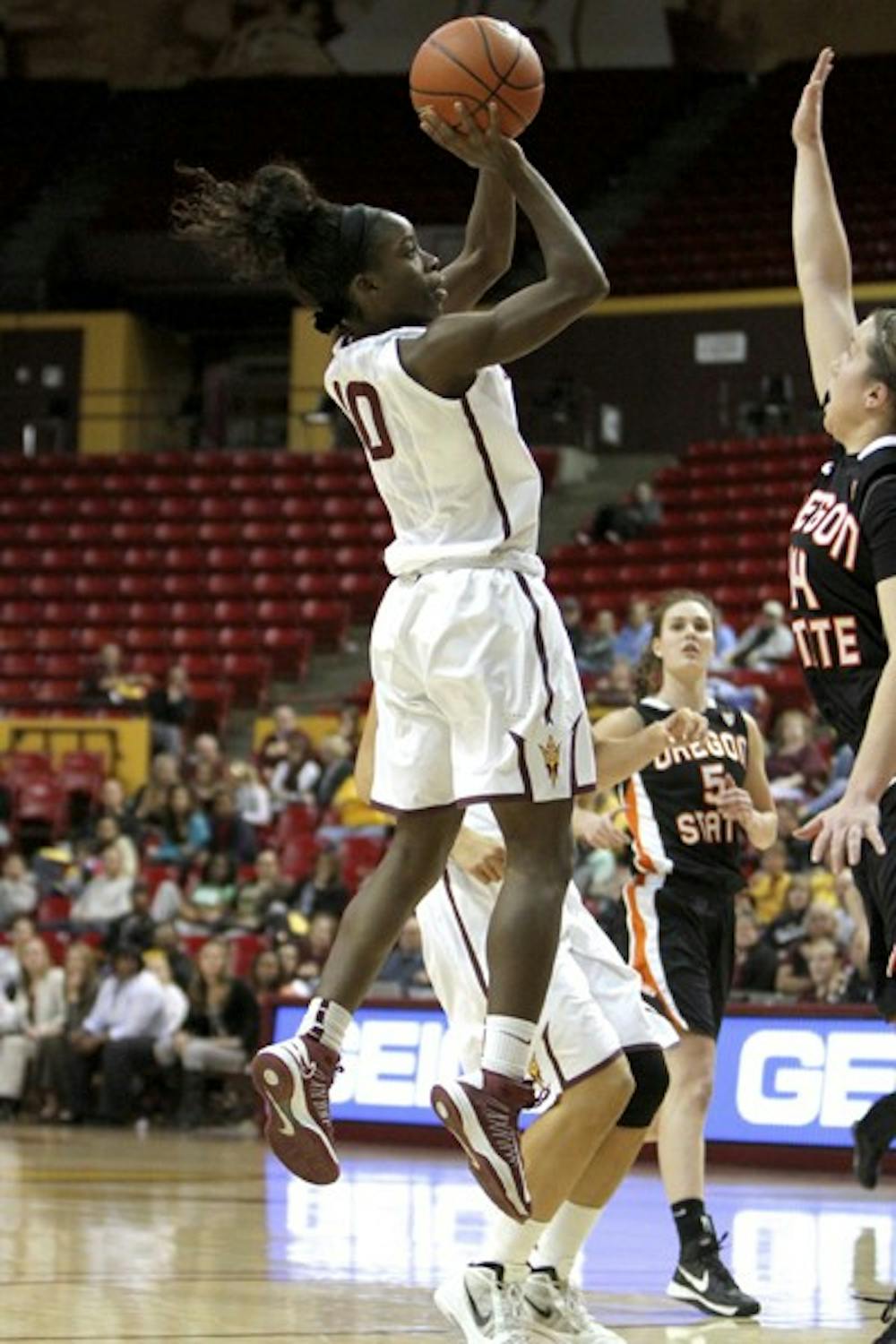 Sophomore guard Promise Amukamara pulls up for a jump shot during Sunday's game against Oregon State. The Sun Devils won 66-55. (Photo by Molly J Smith)