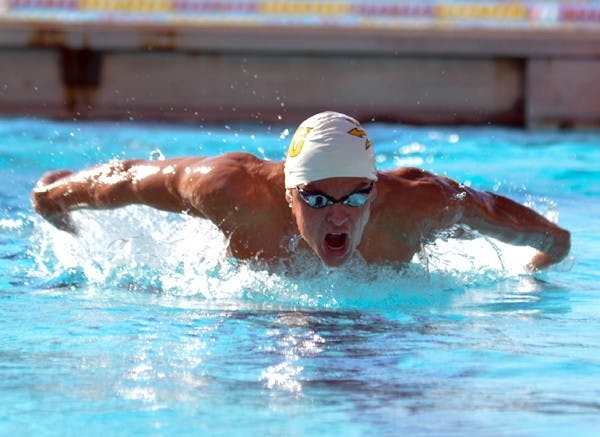 Zac Dalby swims the butterfly in a meet against UA Feb. 11. Coach Dorsey Tierney-Walker expects Dalby to have a breakout performance in the Pac-12 championships. (Photo by Aaron Lavinsky)
