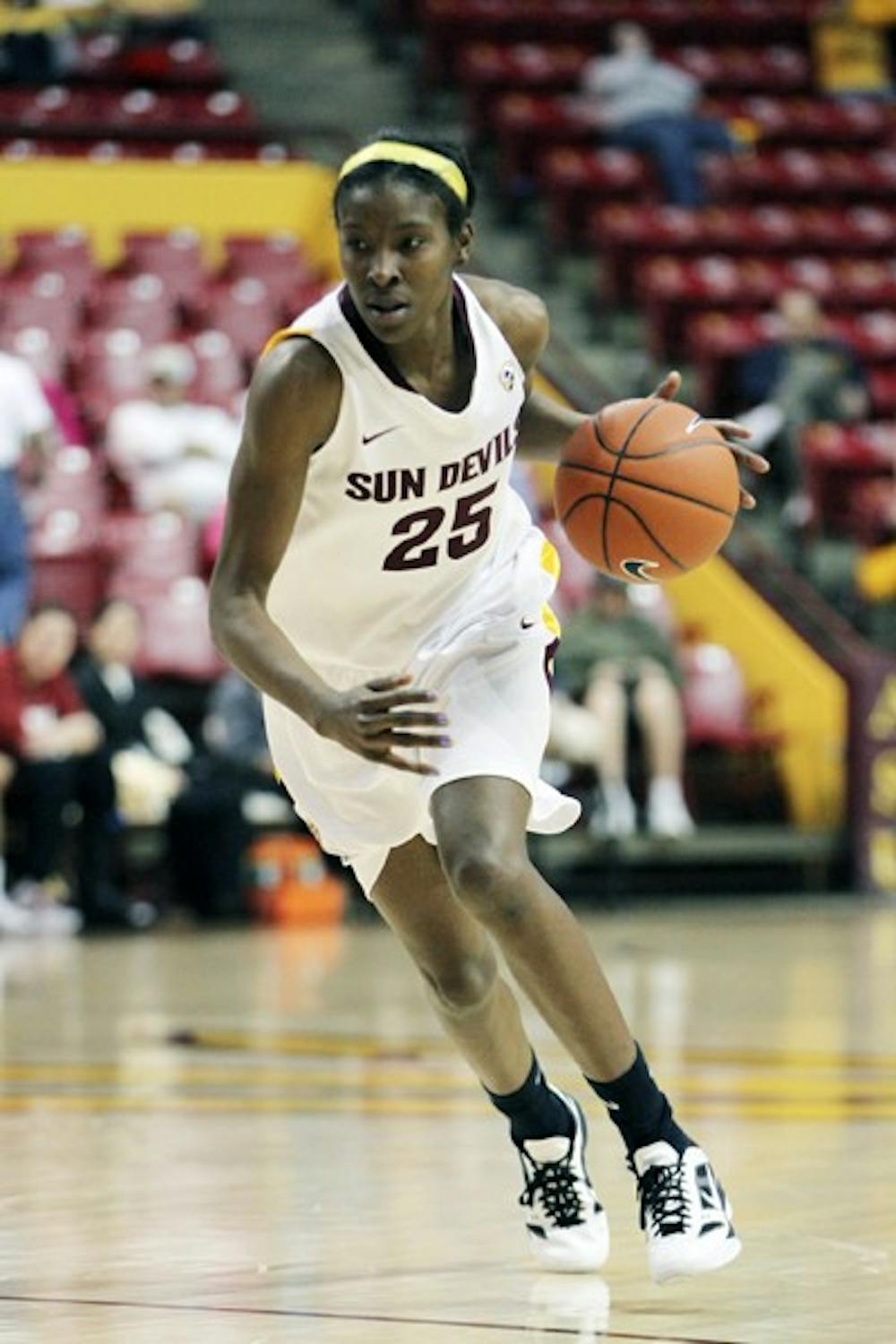 Kimberly Brandon dribbles the ball up the court in a game against Stanford on Feb. 2. Brandon is one of five Sun Devils playing their final games at Wells Fargo Arena this weekend. (Photo by Sam Rosenbaum)
