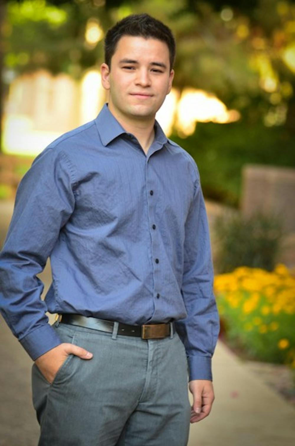 KEEPING THE DREAM ALIVE: German Cadenas, a DREAM act proponent who recently graduated from ASU with degrees in psychology and business, has seen many obstacles in his search for employment. Cadenas, born in Venezuela, is one of many undocumented students who has received a degree from ASU. (Photo by Aaron Lavinsky)