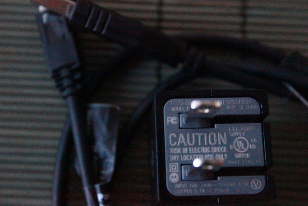 HTC and UK phone carrier O2 are making a more environmentally friendly switch by cutting out the wall charger. Ready for them to go? They think so. Photo by Courtland Jeffrey