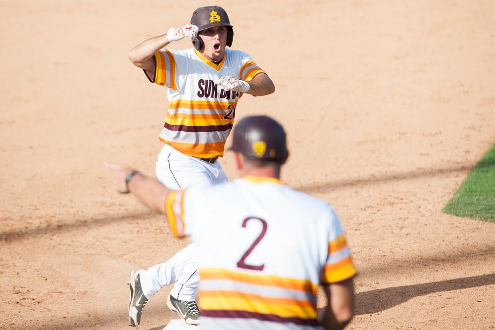 Senior right fielder Trever Allen slides into third for a triple against Clemson on Friday, May 29, 2015, at Goodwin Field in Fullerton, California. The Sun Devils defeated the Tigers 7-4.