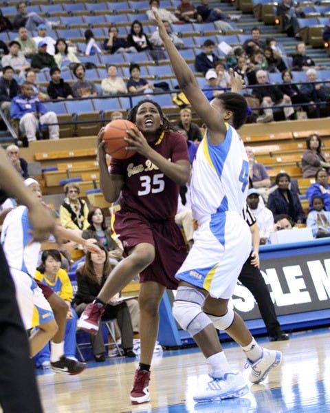 'BOAT’-LOAD OF POINTS: Senior center Eric Boateng shoots over Stanford sophomore forward Jack Trotter during Thursday’s 68-60 win in Palo Alto. Boateng finished with 24 points to lead ASU. (Photo Courtesy of Kyle Anderson The Stanford Daily)