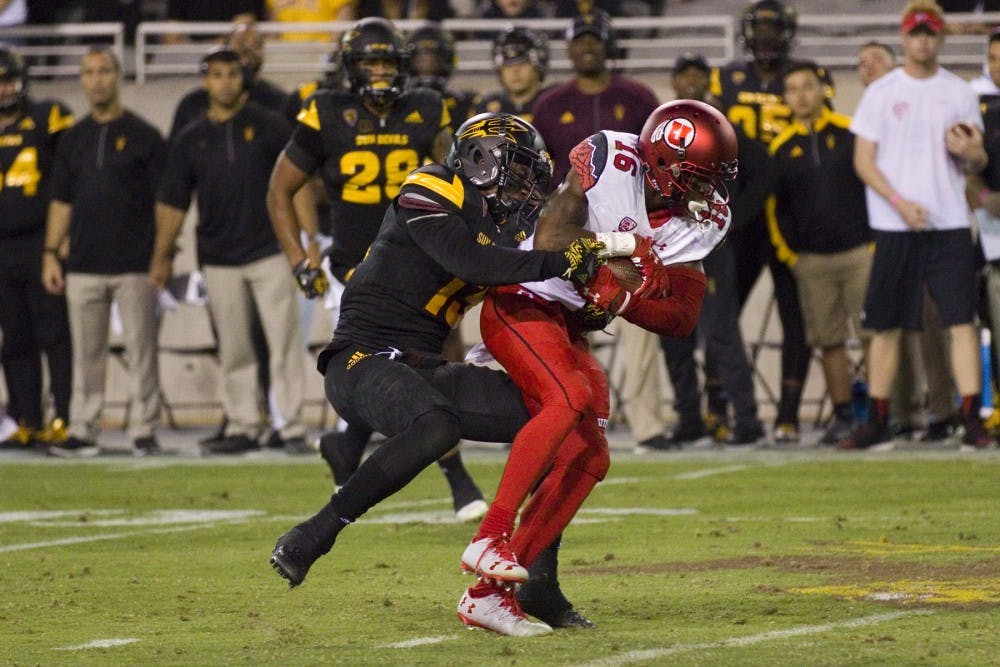 ASU redshirt sophomore safety Armand Perry (13) makes a tackle in the second half of a 49-26 loss to the Utah Utes in Sun Devil Stadium in Tempe, Arizona, on Thursday, Nov. 10, 2016.