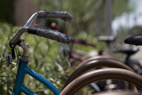In an effort to deter bicycle thefts, the University plans to open a new card-access bicycle storage facility near Payne Hall on the Tempe Campus on Nov. 4. (Photo by Dominic Valente)