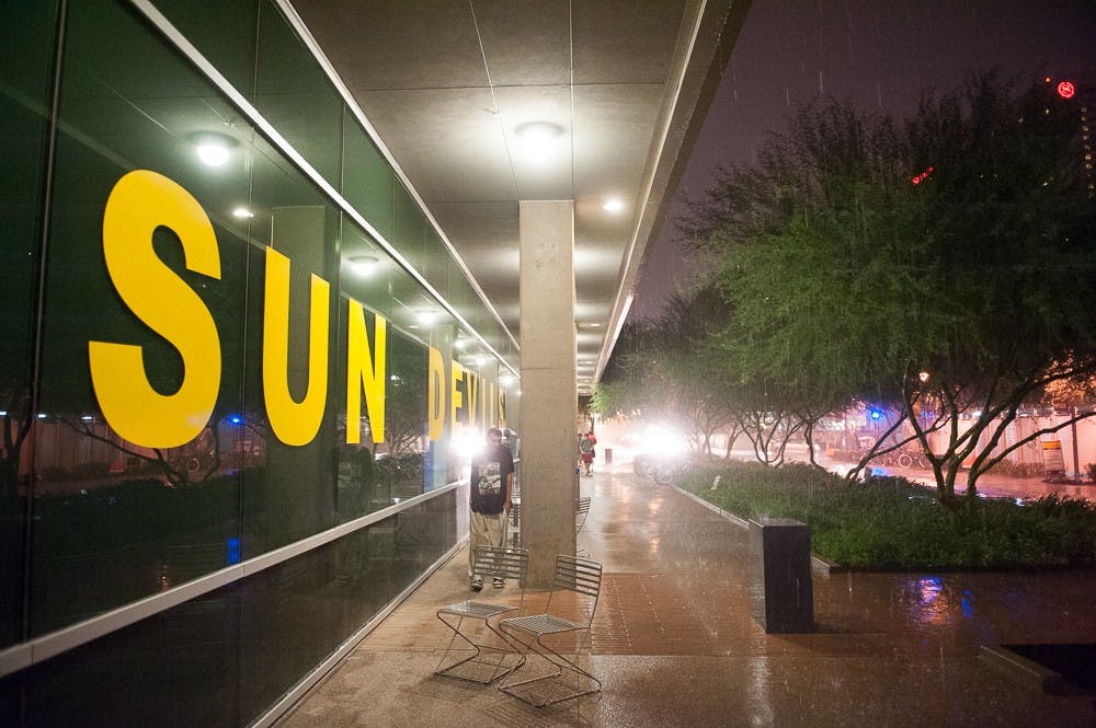 Rain pounds the downtown campus on Monday, Sept. 14, 2015, in Phoenix.