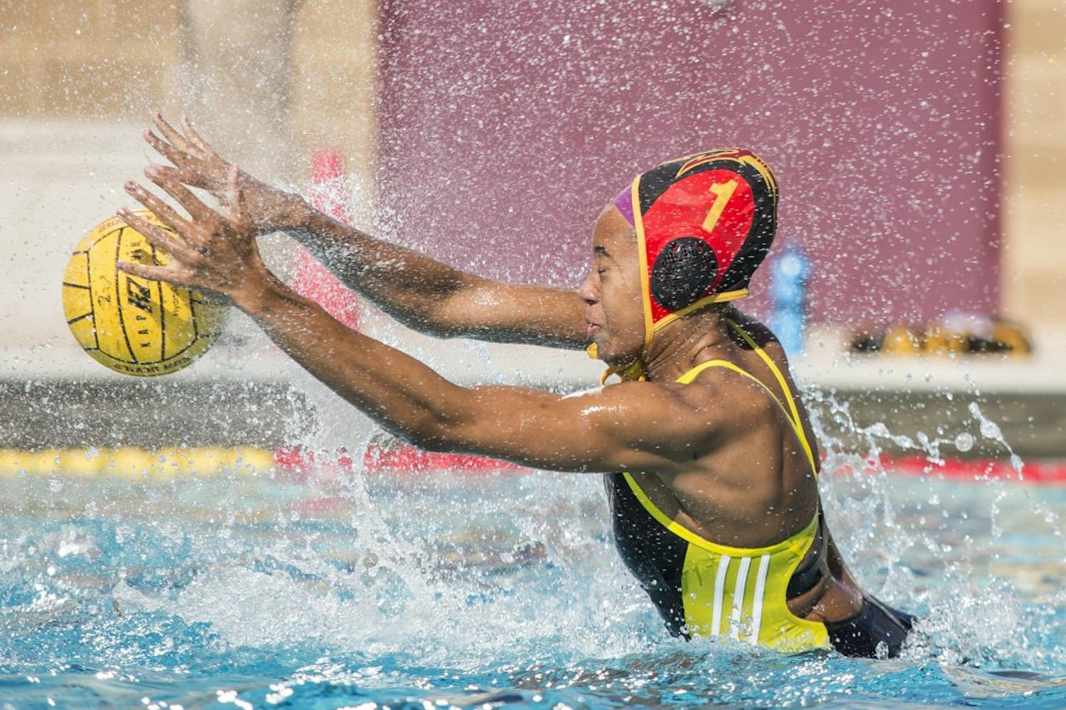ASU goalie Mia Rycraw blocks a shot-on-goal during a game against the Indiana University Hoosiers at Mona Plummer Aquatic Center in Tempe, Ariz., on Sunday, Jan. 24, 2015. The Sun Devils won the game with a final score of 23-4. 