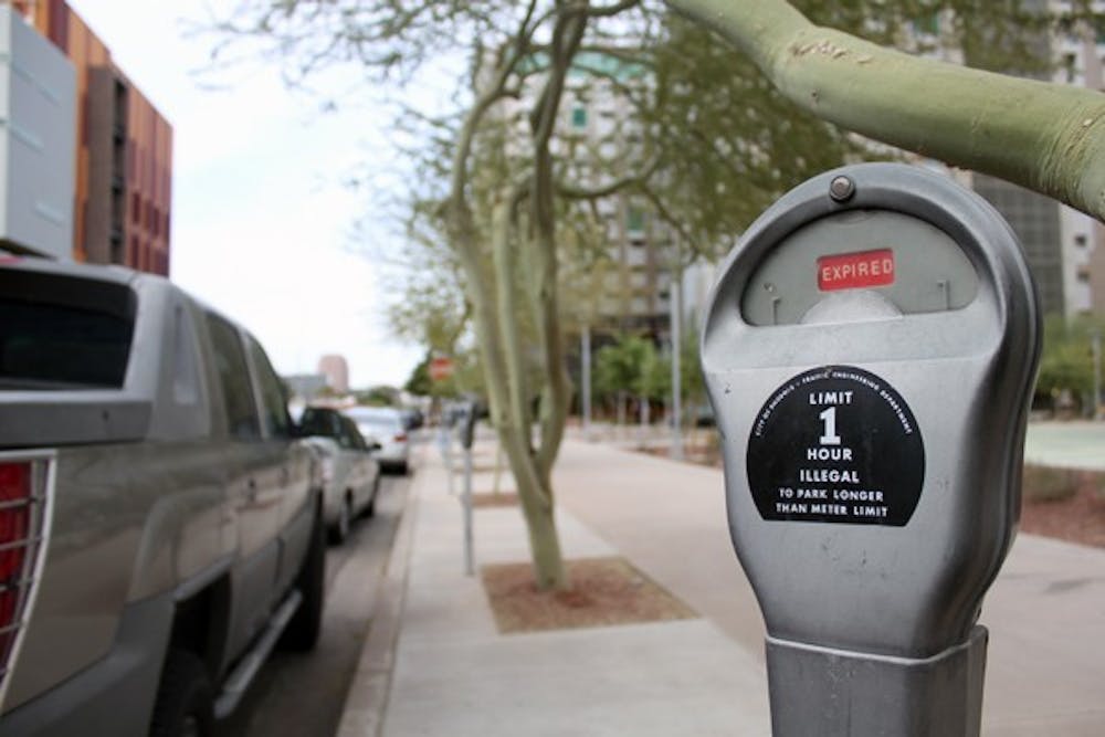 Parking meter hours in downtown Phoenix will be switching from 8:00 p.m. to 5:00 p.m. The city also plans to update meters from the current ‘30s technology, which could include paying with credit or debit cards. (Photo by Jenn Allen)