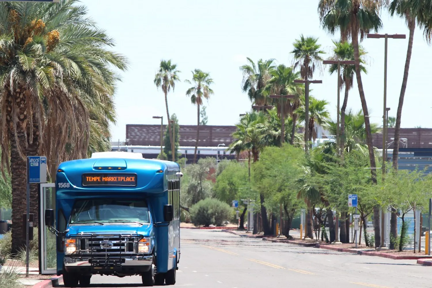 An Orbit shuttle bus stops near lot 59 on the Tempe campus. New Orbit buses that feature a unique design will be implemented before the fall semester starts, according to campus officials. (Photo by Dominic Valente.)