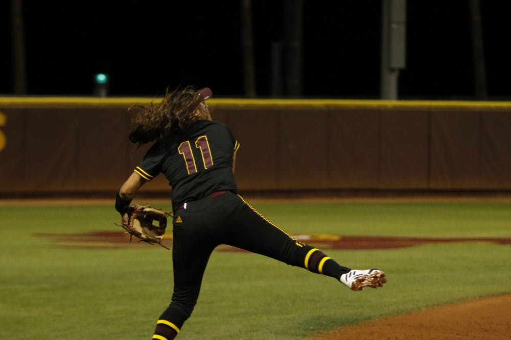 ASU senior short stop Chelsea Gonzales (11) catches the ball and throws it to first base in a softball game versus Oregon State University at Alberta B. Farrington Stadium in Tempe, Arizona on Sunday, March 26, 2017. The Sun Devils won the game 11-0.