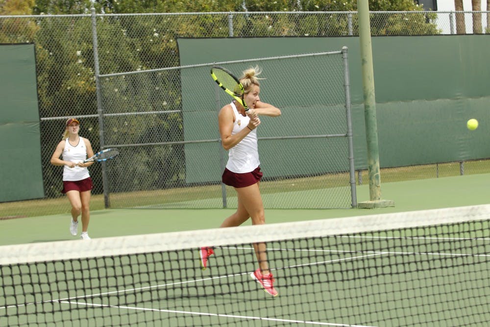ASU junior Kelley Anderson and freshman Savannah Slaysman compete in a doubles match versus UNLA at the Whiteman Tennis Center in Tempe, Arizona on Wednesday, March 22, 2017.